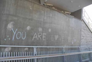 In the midst of pandemic anxiety and BLM awareness, he message “You are loved!!!” appeared in pastel chalk on the OOE-side abutment. Photo by John Dance